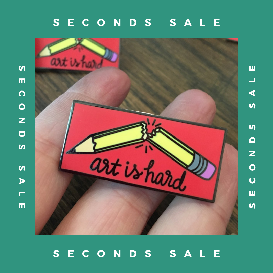 SECONDS SALE PIN - Art Is Hard - Black Nickel Hard Enamel Pin - Red Apple Variant
