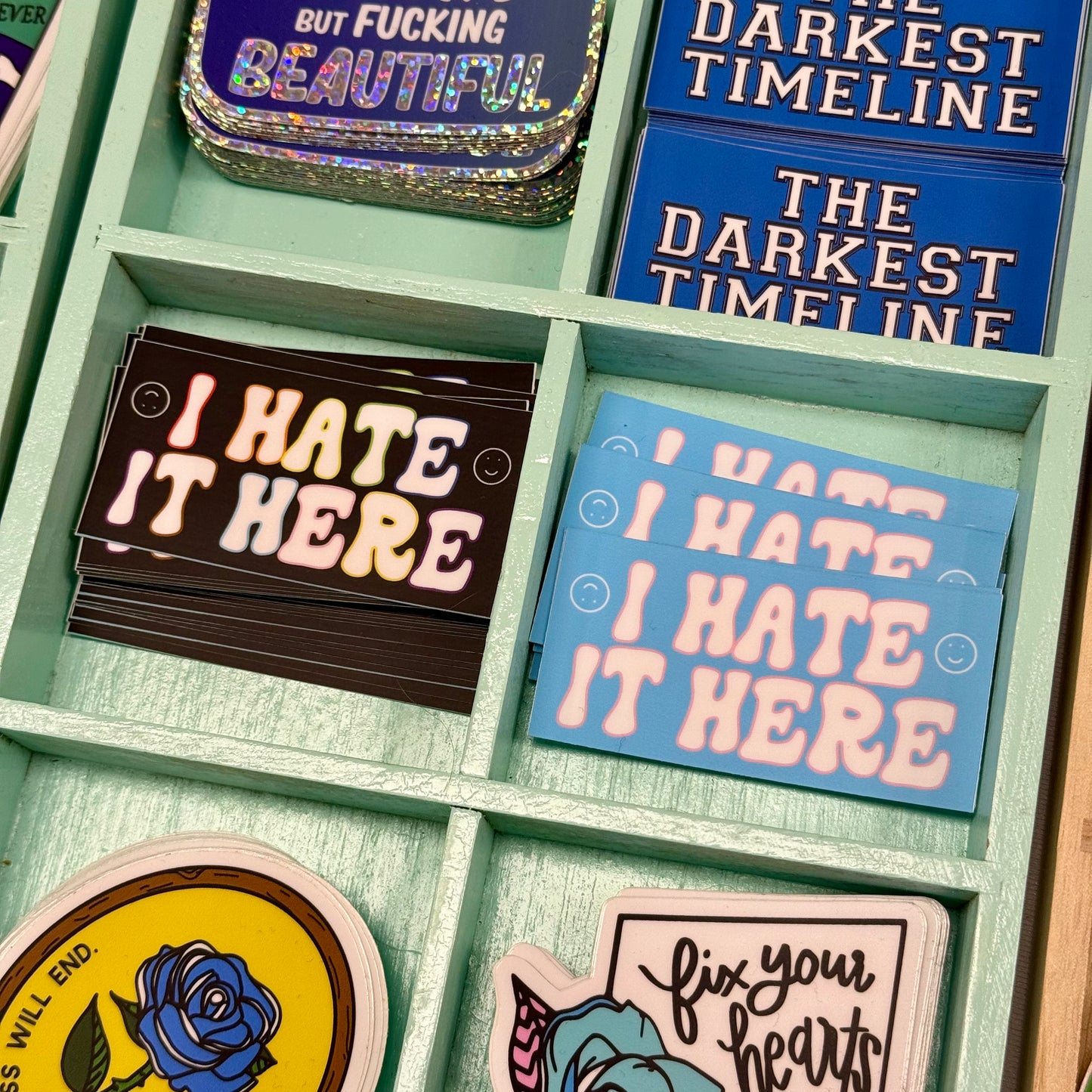 I Hate It Here Vinyl Sticker - Trans Pride Flag Colors