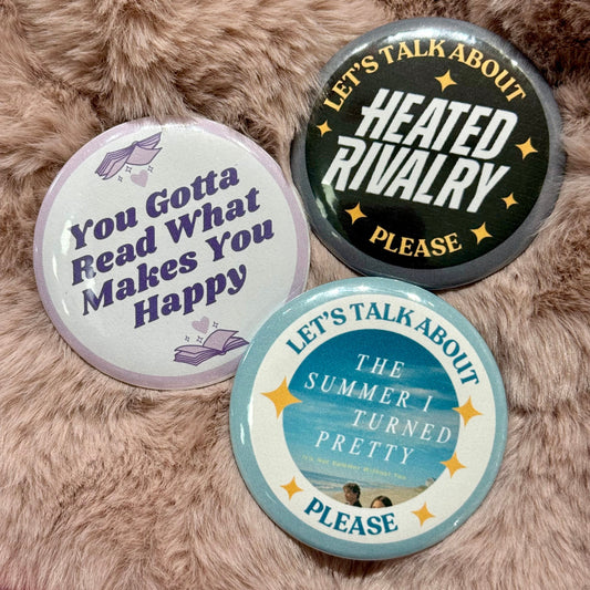 Three buttons with motivational phrases on a fluffy surface
