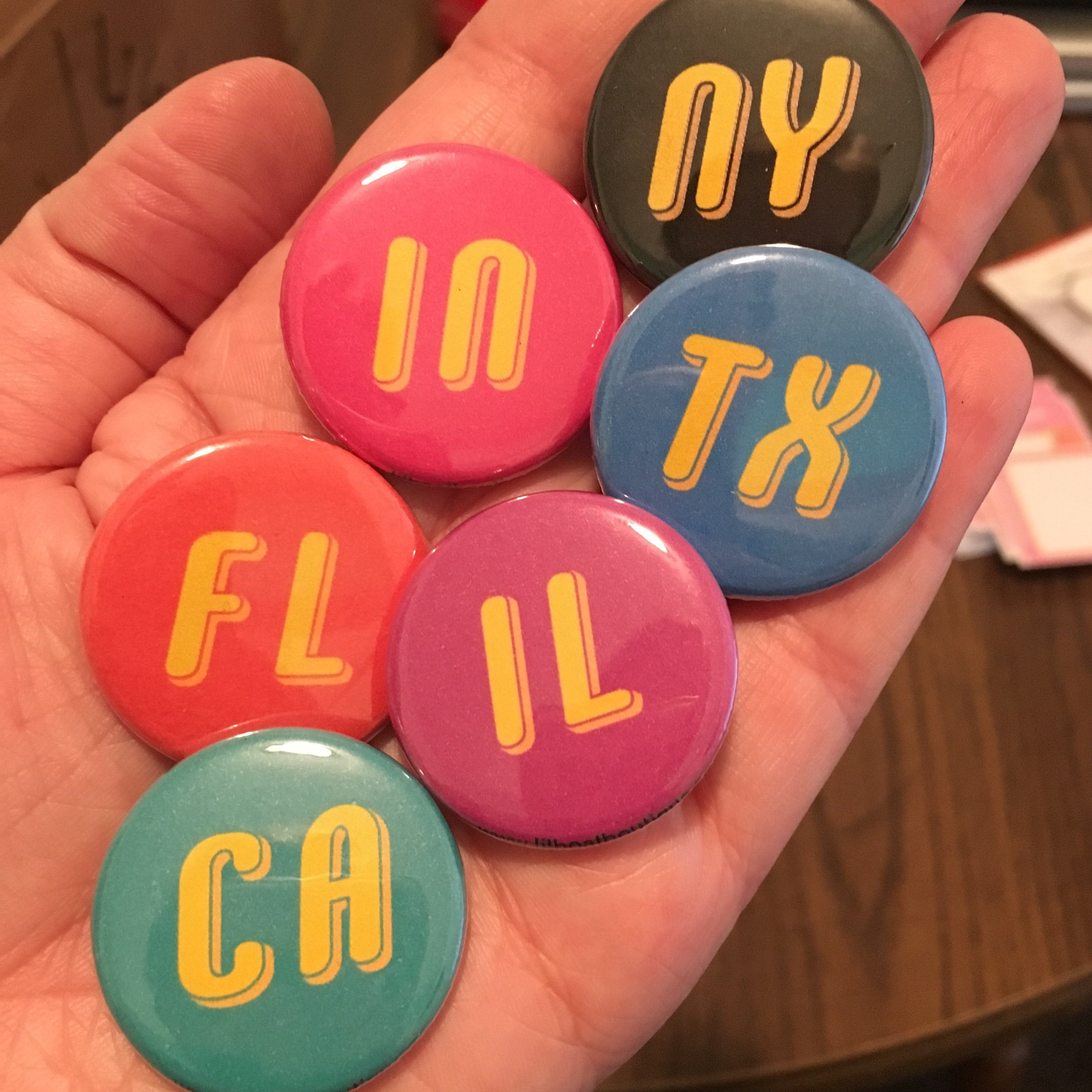 Buttons on sale with initials